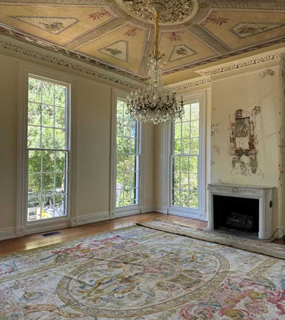 Elegant room with chandelier and fireplace