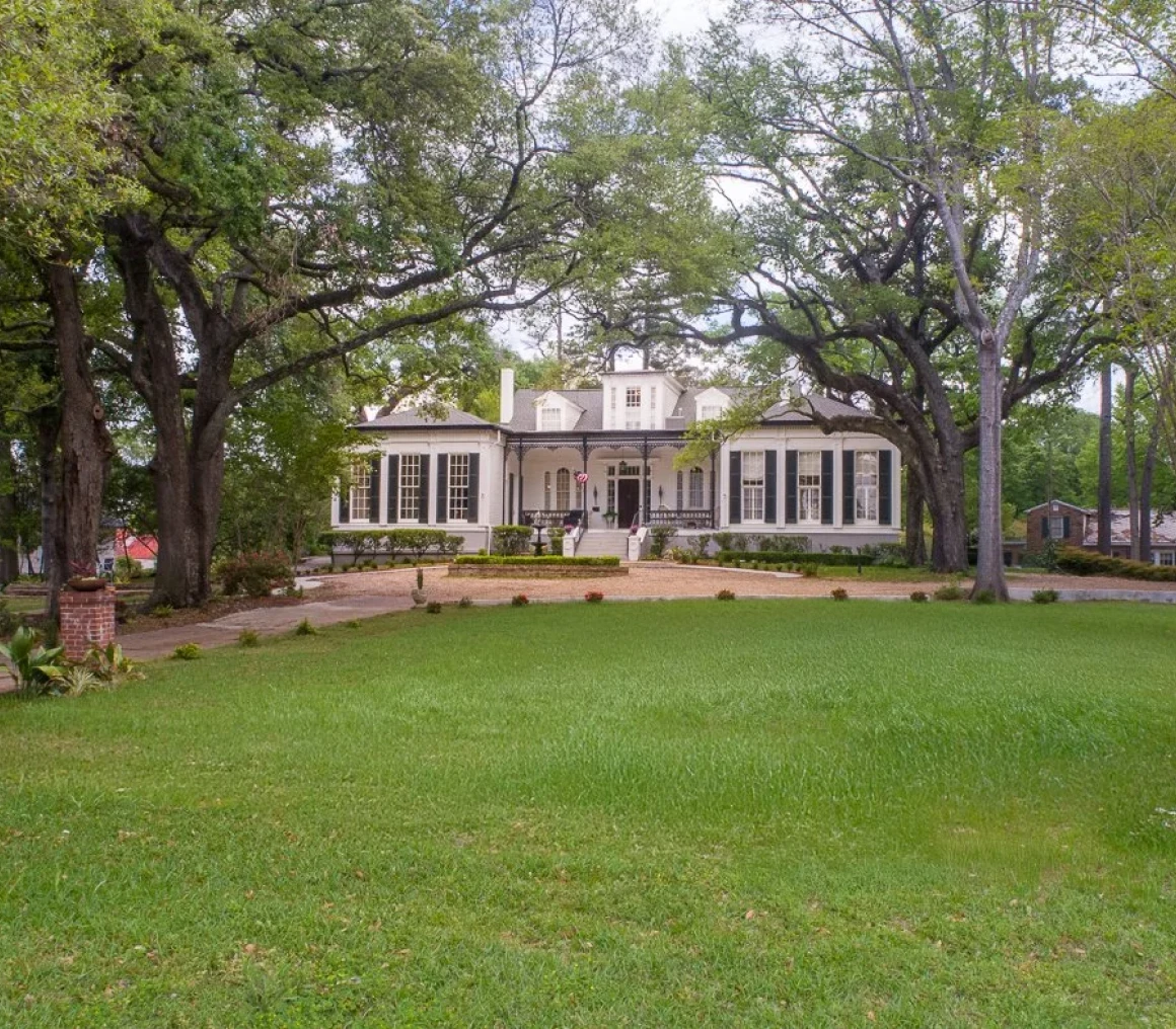 Elegant estate with expansive front lawn